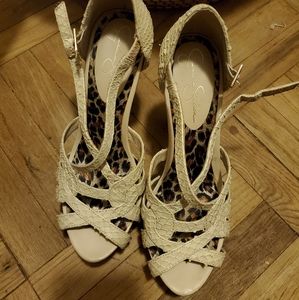 Bone colored snake platform heels